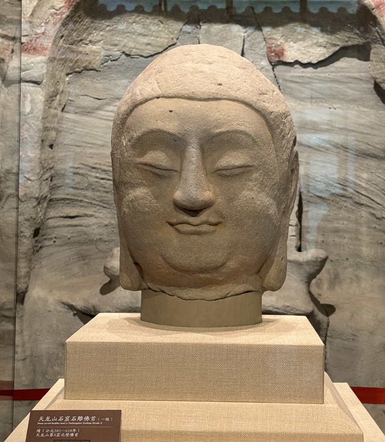 The Buddha head from the 8th cave of the Tianlong Mountain Grottoes in Taiyuan, North China's Shanxi Province, is now on display at Taiyuan Museum. The Buddha was brought back from Japan in 2020 after being lost overseas nearly a century ago.Photo:Cao Siqi/Global Times 