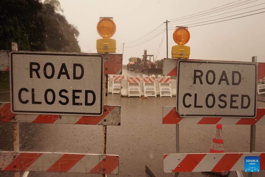 A hillside road is blocked in Studio City, California, the United States, Feb. 20, 2024. A powerful storm continues to slam the U.S. West Coast on Tuesday with heavy rain, snow and wind, as flood watch remains in effect across California.(Photo: Xinhua)