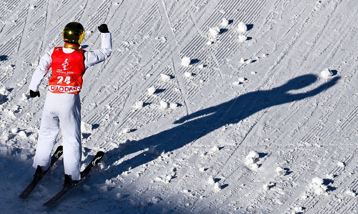 Kong Fanyu, representing Northeast China's Heilongjiang Province, celebrates after winning a gold medal in the freestyle skiing women's aerials competition at the 14th National Winter Games in Hulunbuir, North China's Inner Mongolia Autonomous Region, on February 21, 2024. Photo: Courtesy of the organizing committee
