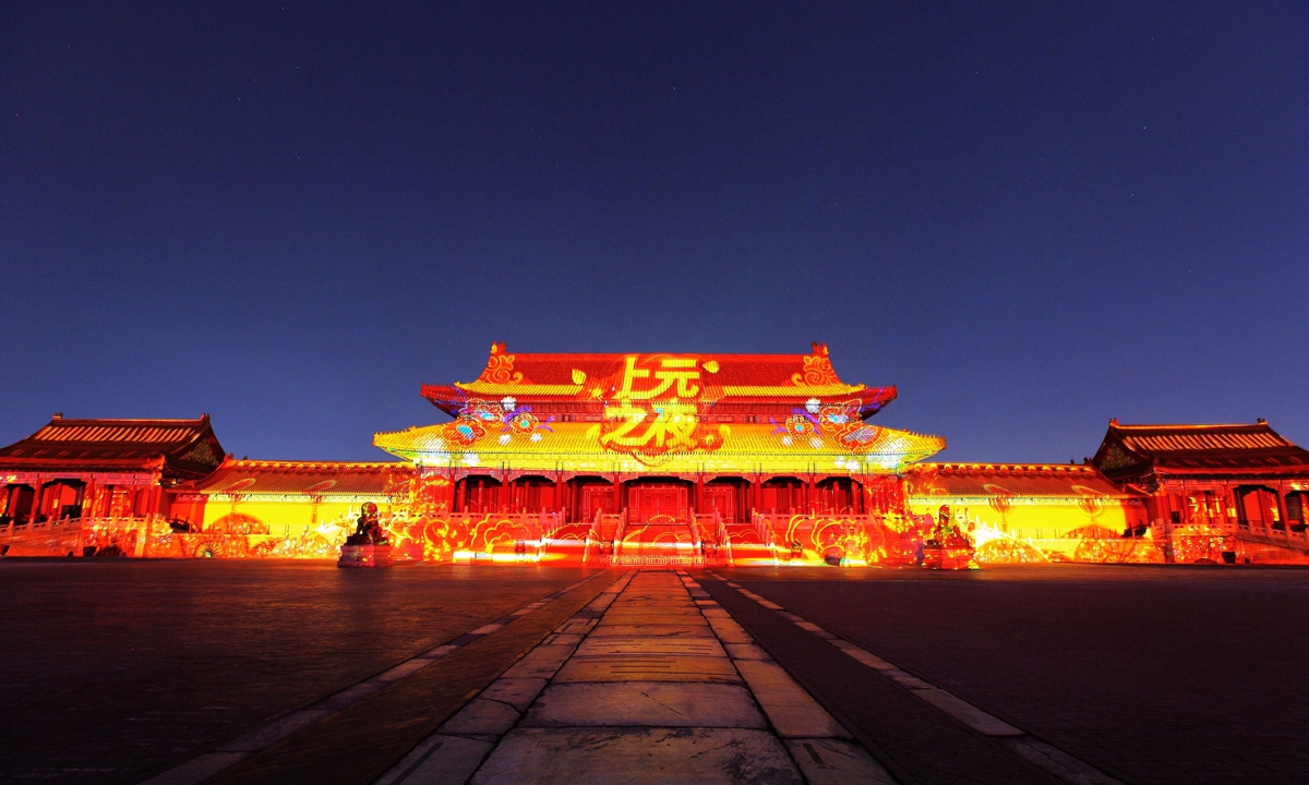 The Palace Museum is illuminated during its first light show for the Lantern Festival.
Photo: VCG