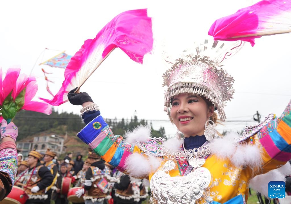 A local resident performs in celebration of the upcoming Lantern Festival in Rongshui Miao Autonomous County, south China's Guangxi Zhuang Autonomous Region, Feb. 22, 2024. The Lantern Festival falls on Feb. 24 this year(Photo: Xinhua)