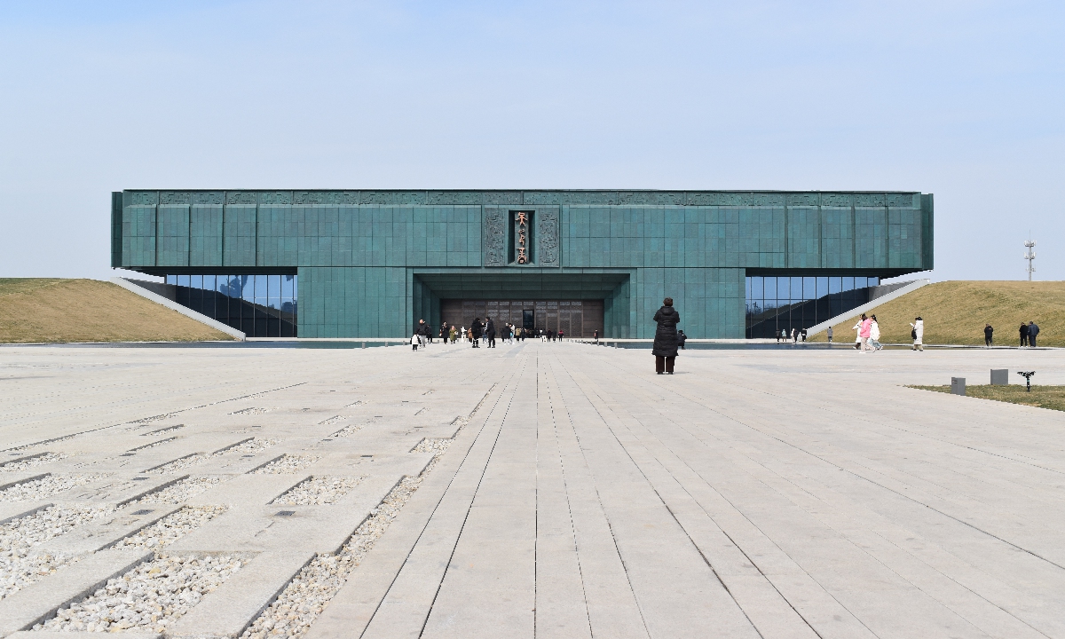 People visit the new building of the Yinxu Museum in Anyang, Henan Province, as it officially opens to the public on February 26, 2024. Nearly 4,000 items or sets of Shang Dynasty (c.1600BC-1046BC) cultural relics, sunch as bronzewares, pottery, jade objects and oracle bones, are on display at the new building, including the only bull-like brone wine vessle unearthed at the Yin Ruins. Photo: Chen Xi/GT