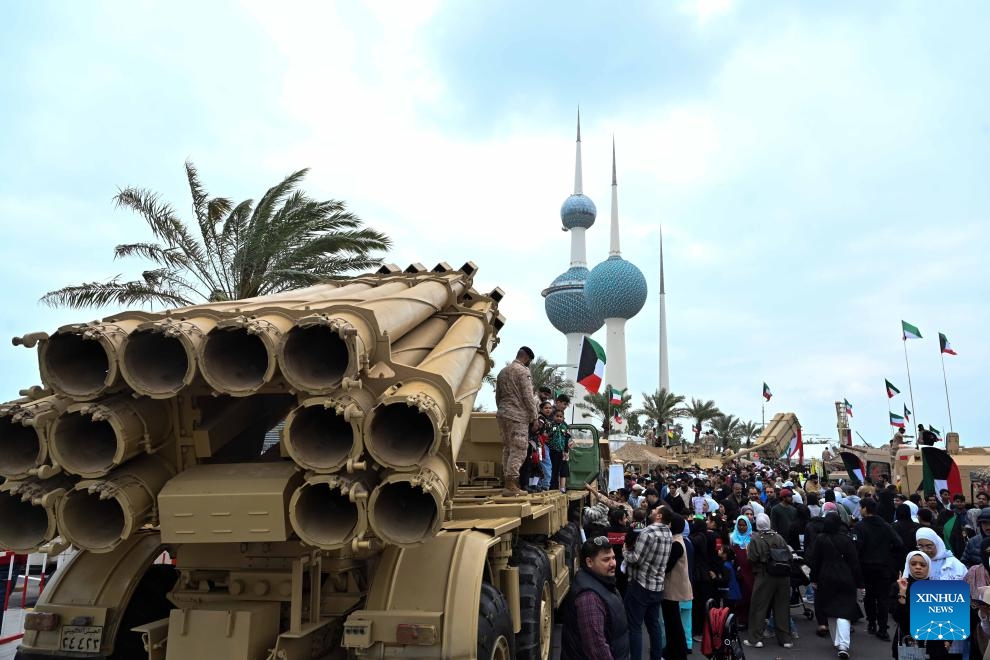 An army parade is seen during the celebration in Capital Governorate, Kuwait, Feb. 25, 2024. Kuwaitis celebrate their national and liberation days on Feb. 25 and 26 every year.(Photo: Xinhua)
