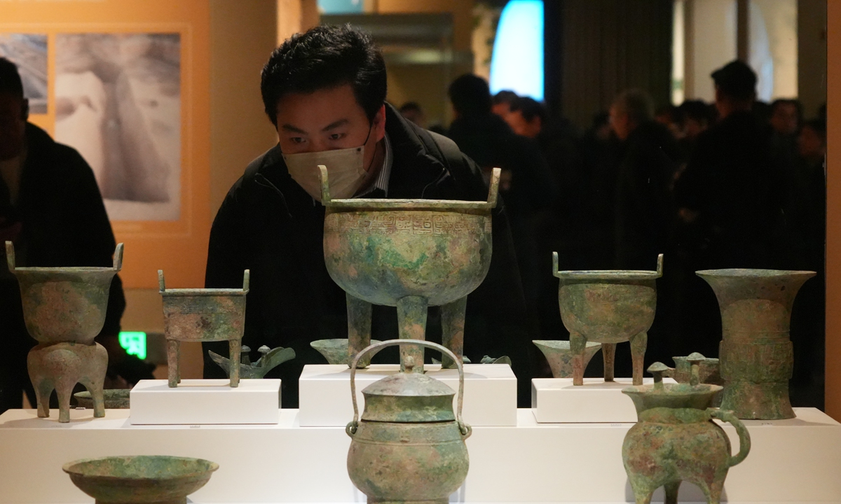 Visitors explore an exhibition at the new building of the Yinxu Museum in Anyang, Henan Province.Photo: VCG