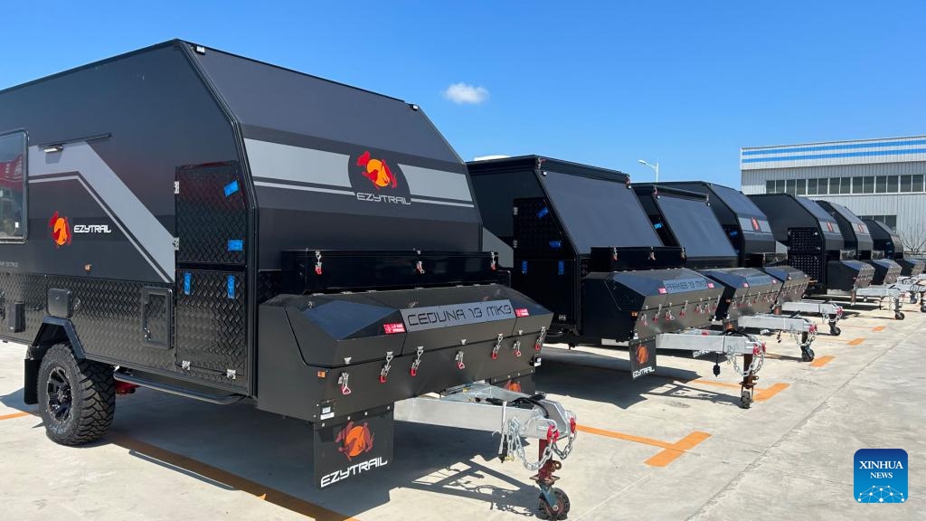 This photo taken on Aug. 10, 2023 shows recreational vehicles (RVs) produced by Rongcheng Compaks New Energy Automobile Co., Ltd. in Rongcheng City, east China's Shandong Province. Rongcheng City in east China's Shandong Province, a major production and export base for recreational vehicles (RVs) in China, registered an export value for RVs at 1.82 billion yuan (about 256 million U.S. dollars) in 2023, marking a year-on-year increase of 17.8 percent, according to official data.(Photo: Xinhua)