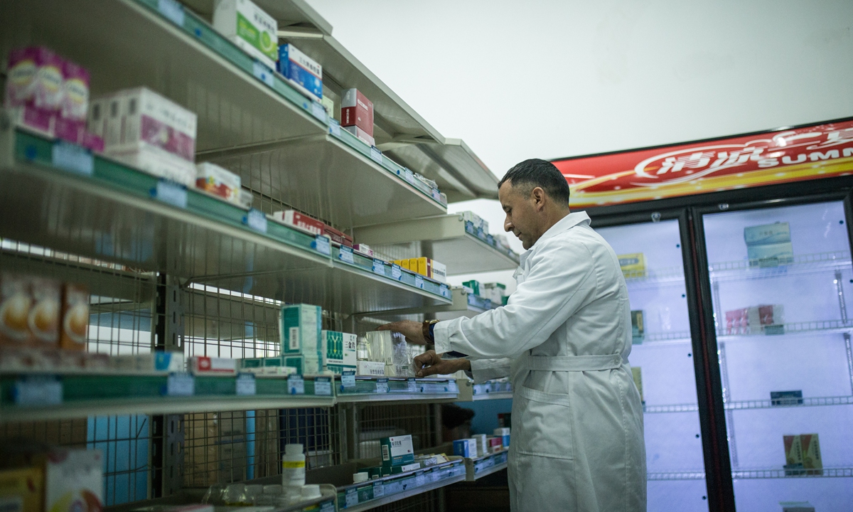 A doctor checks medicine in the pharmacy of Daliyabuyi's clinic on February 28, 2024. Photo: Shan Jie/GT