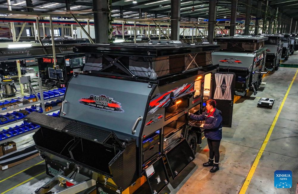 This photo taken on Feb. 18, 2024 shows a worker assembling recreational vehicles (RVs) at Rongcheng Compaks New Energy Automobile Co., Ltd. in Rongcheng City, east China's Shandong Province. Rongcheng City in east China's Shandong Province, a major production and export base for recreational vehicles (RVs) in China, registered an export value for RVs at 1.82 billion yuan (about 256 million U.S. dollars) in 2023, marking a year-on-year increase of 17.8 percent, according to official data.(Photo: Xinhua)