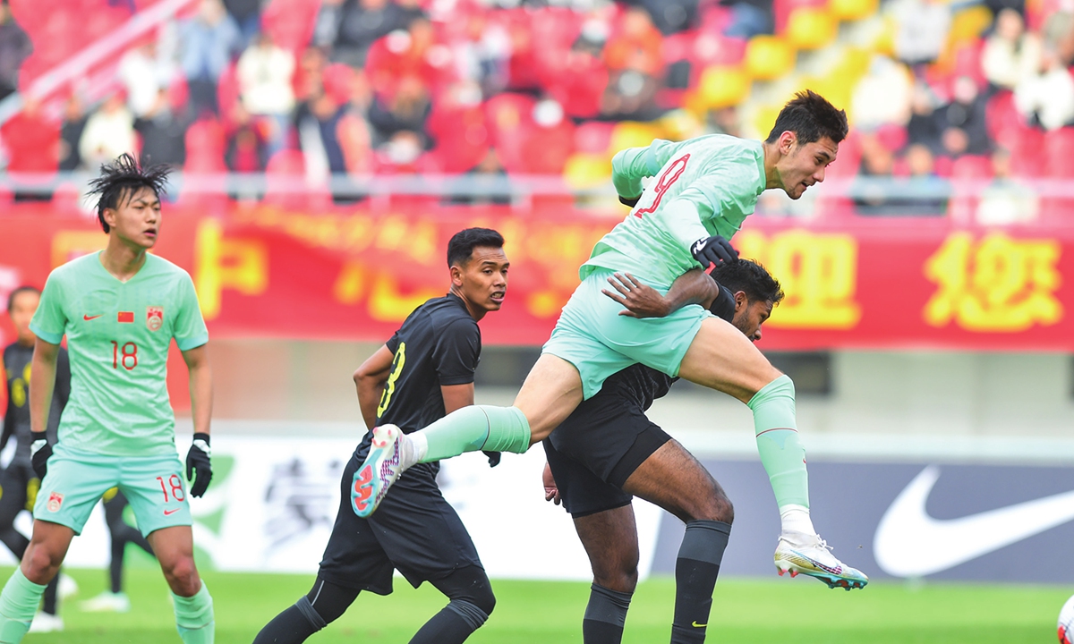 Behram Abduweli plays as a member of the Chinese Olympic soccer team in 2023. Photos: VCG