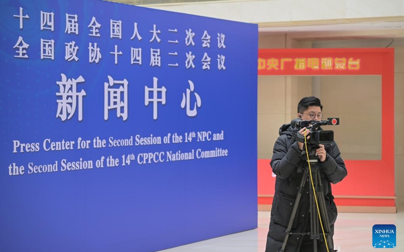 A reporter works at the press center for China's upcoming annual legislative and political consultative sessions in Beijing, capital of China, Feb. 27, 2024. The press center opened Tuesday at the Media Center Hotel in Beijing. The second session of the 14th National People's Congress (NPC) and the second session of the 14th National Committee of the Chinese People's Political Consultative Conference (CPPCC) will open on March 5 and 4, respectively. Photo: Xinhua