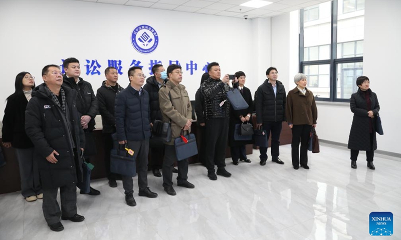 Sun Dongming (3rd R) attends an activity to improve public knowledge of the Constitution in Shenyang, northeast China's Liaoning Province, Dec. 4, 2023. Photo: Xinhua