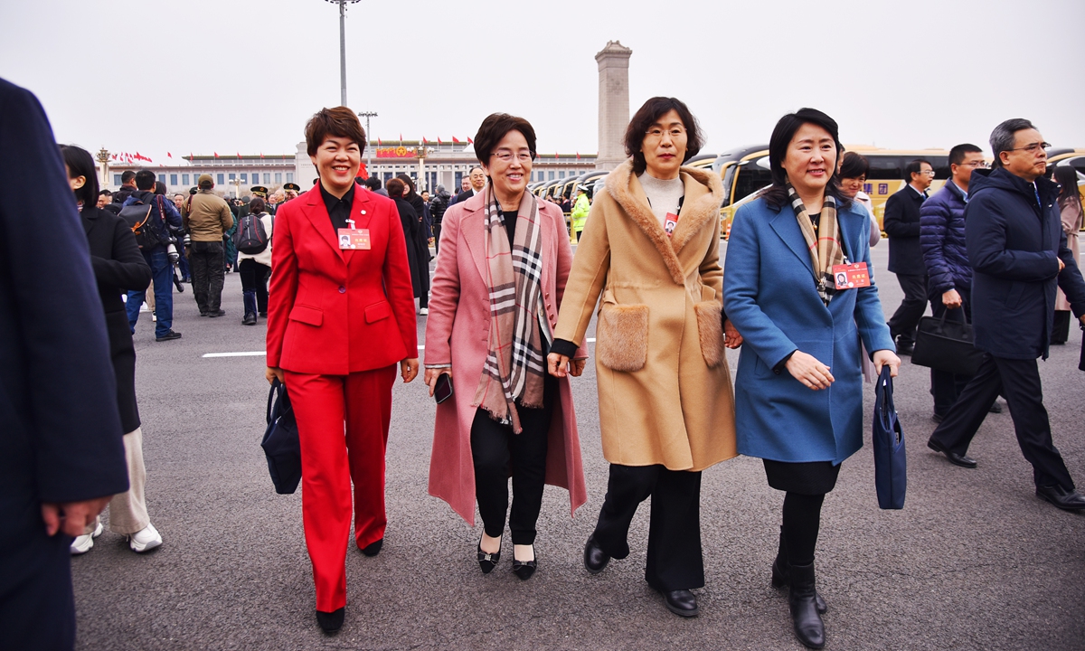 Political advisors walk to the Great Hall of the People before the opening of the second session of the 14th Chinese People's Political Consultative Conference (CPPCC) National Committee in Beijing on March 4, 2024. Photo: VCG