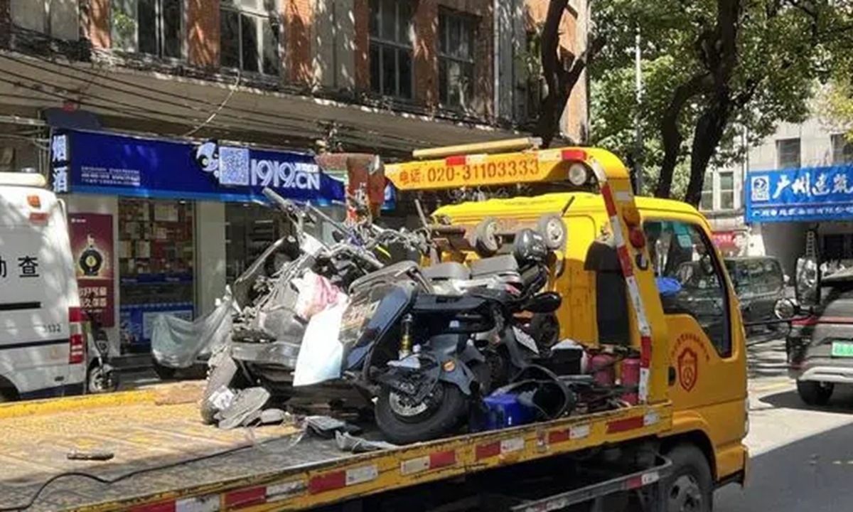 A car successively collided with pedestrians and electric bicycles on Zhongshan road and Guangren road in Yuexiu district, South China's Guangzhou Province. Photo: web
