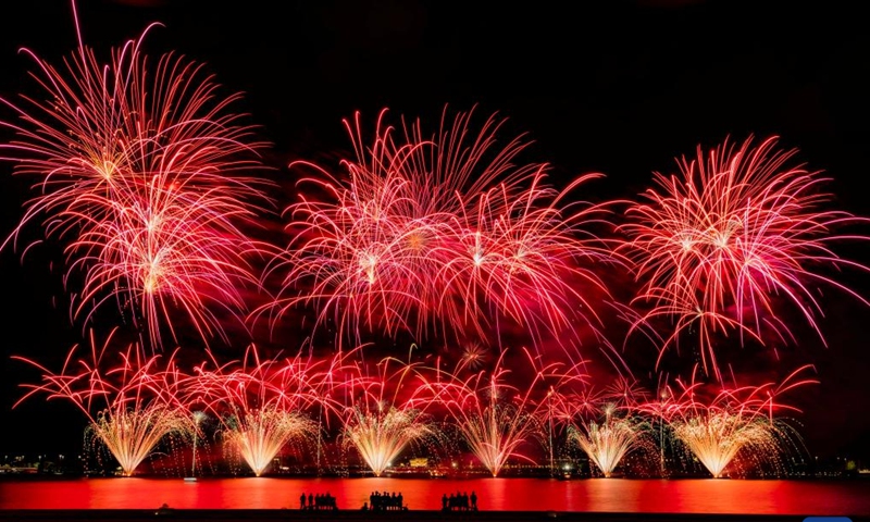 Fireworks illuminate the sky over Lake Burley Griffin during a fireworks show in Canberra, Australia, March 16, 2024. After a 5-year hiatus, the fireworks show was back on Saturday. (Photo by Chu Chen/Xinhua)