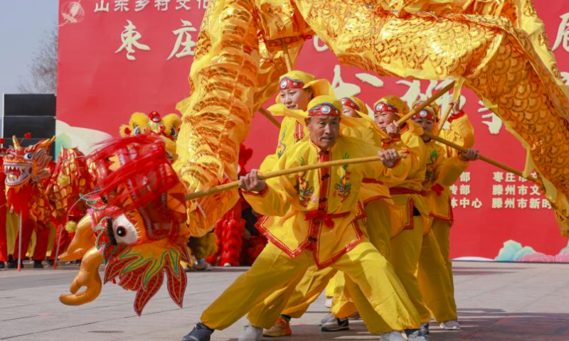 Folk artists give a dragon dance performance in Zaozhuang City, east China's Shandong Province, March 9, 2024.
Various celebrations were held for the upcoming Longtaitou Day, a traditional day for a new haircut after the Spring Festival.
The day of Longtaitou, which literally means dragon raises head, falls on the second day of the second lunar month. (Photo by Wang Longfei/Xinhua)