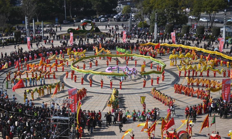 Folk artists perform dragon dance in celebration of the upcoming Longtaitou Day in Fenghua, east China's Zhejiang Province, March 10, 2024. Fenghua Cloth Dragon, one of the country's most representative dragon dances, was listed as a national intangible cultural heritage in 2006.

A grand parade was organized in Fenghua on Sunday, one day ahead of the traditional Longtaitou Day, literally meaning dragon raises head, to celebrate the occasion. (Xinhua/Huang Zongzhi)