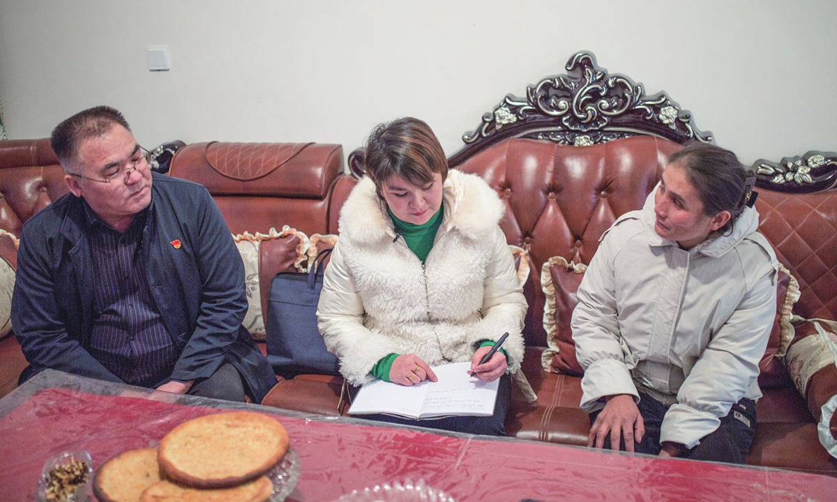 Rukeyamu Maitisaidi, an NPC deputy from Northwest China's Xinjiang Uygur Autonomous Region, stands outside the Great Hall of the People in Beijing on March 5. Photo: Courtesy of Rukeyamu Maitisaidi
