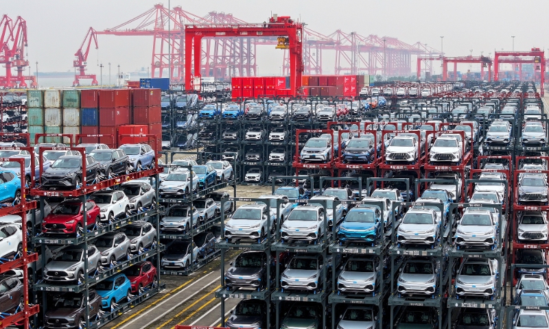 A batch of new energy vehicles is about to be exported at the Port of Suzhou on December 13, 2023. Photo: VCG
