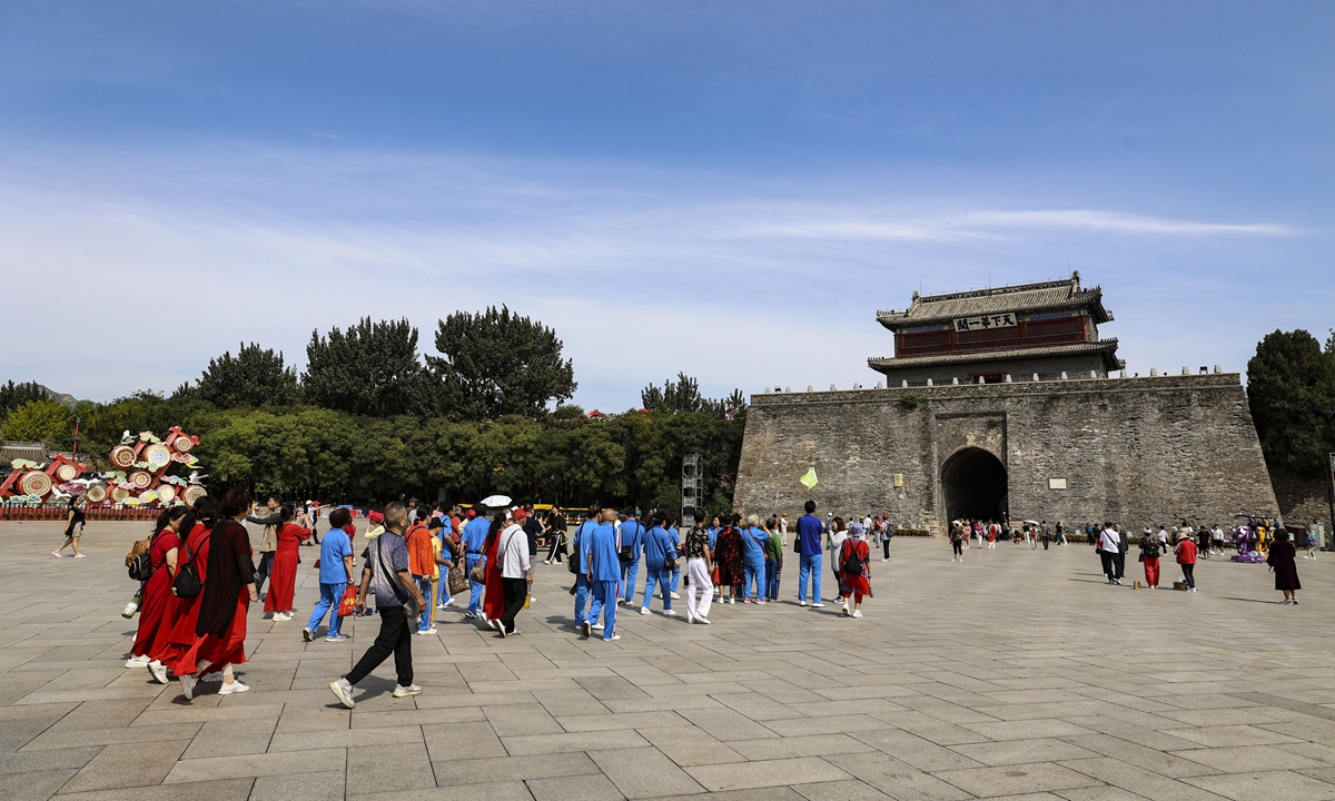 Tourists enjoy the scenery at the Shanhaiguan Pass, the eastern terminal of the Great Wall, in Hebei Province. Photo: VCG