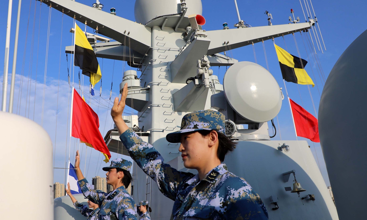 Female sailors on the Guiyang ship wave goodbye as the 36th batch of naval escort fleet set sail from a port in Qingdao, East China's Shandong Province, on September 3, 2020, heading to the Gulf of Aden. Photo: VCG  