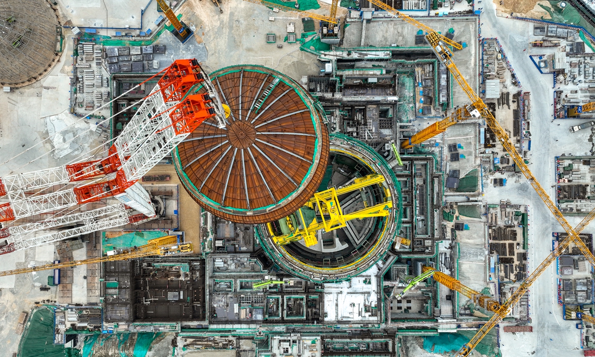 Unit 4 of Hualong One nuclear reactor completes dome lifting and positioning at the Changjiang Nuclear Power Plant in South China's Hainan Province on December 27, 2023. Photo: VCG