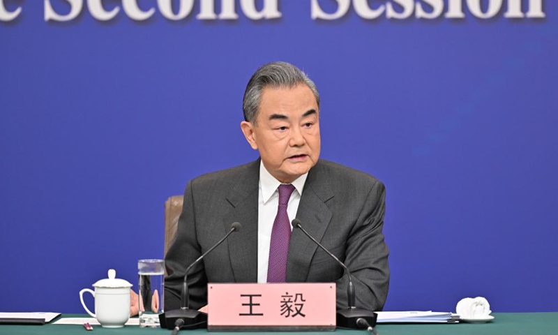 Chinese FM raises four questions for US, urging Washington to fulfill its commitments