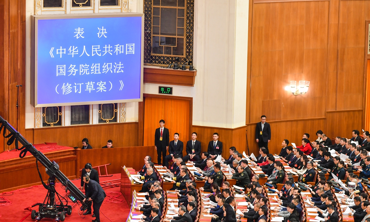 Chinese national lawmakers  passed a revised Organic Law of the State Council at the closing meeting of the second session of the 14th National People's Congress on March 11, 2024. Photo: VCG