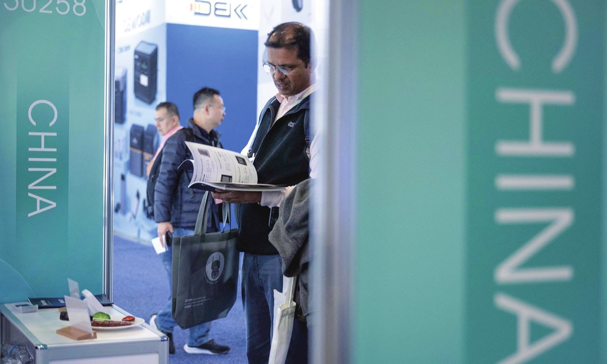 People walk past exhibits from China at the Venetian Expo Center during the Consumer Electronics Show in Las Vegas, the US, on January 11, 2024.Photo: VCG