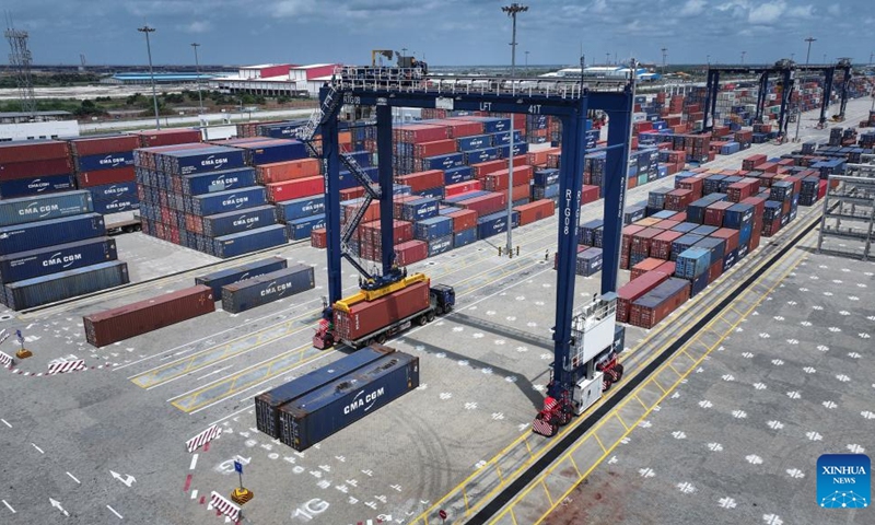 A drone photo taken on March 1, 2024 shows a view of the Lekki port in Lagos, Nigeria. The Lekki port is a commercial cooperation project between China, France and Nigeria. Constructed by the China Harbor Engineering Company Ltd (CHEC), it stands as Nigeria's first deep seaport and one of the largest in West Africa. The construction, initiated in June 2020, was completed in October 2022.(Photo: Xinhua)