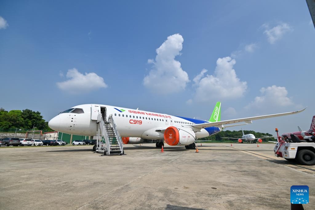 This photo taken on March 13, 2024 shows a C919 commercial aircraft, manufactured by Commercial Aircraft Corporation of China, Ltd. (COMAC), on display at the Sultan Abdul Aziz Shah Airport in Selangor state, Malaysia. The static display and demonstration flight of the China-manufactured commercial aircraft ARJ21 and C919 were held here on Wednesday.(Photo: Xinhua)