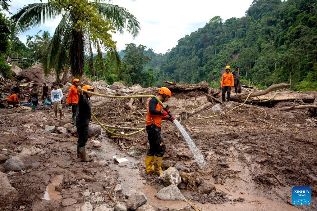Rescuers carry out search operation after floods and landslides at Pesisir Selatan Regency in West Sumatra, Indonesia, March 13, 2024. The death toll from floods and landslides in the Indonesian province of West Sumatra has risen to 32, the country's National Disaster Mitigation Agency reported on Tuesday.(Photo: Xinhua)