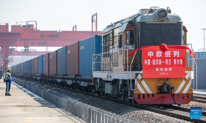 This photo taken on March 14, 2024 shows an international freight train preparing to depart from Harbin international container center station in Harbin, capital of northeast China's Heilongjiang Province.(Photo: Xinhua)