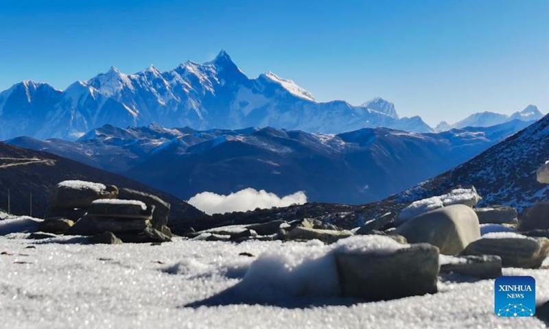 Photo taken on Dec 16, 2021 with a mobile phone shows Mount Namjagbarwa in Nyingchi, southwest China's Tibet Autonomous Region.Photo:Xinhua