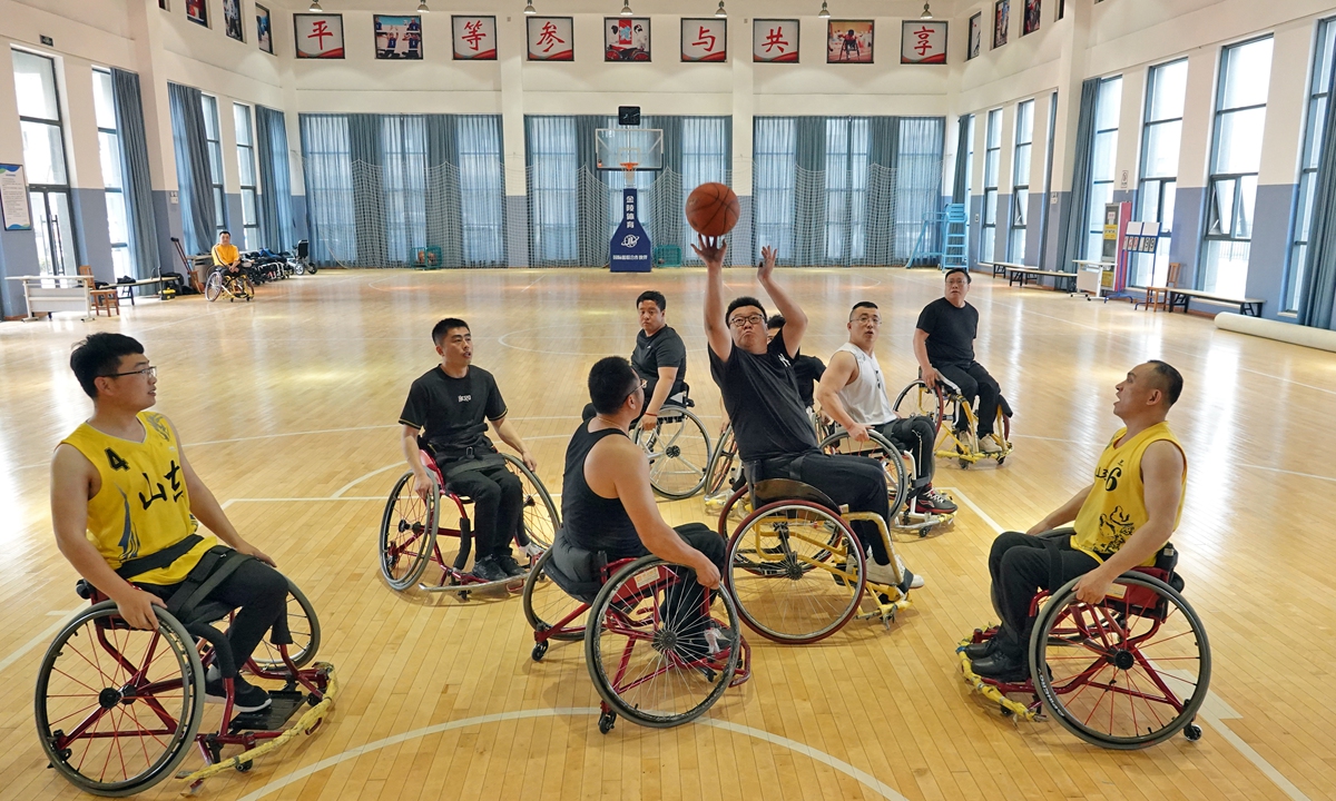 People with disabilities play basketball in Yantai city, Shandong, on May 14, 2021. Photos: VCG