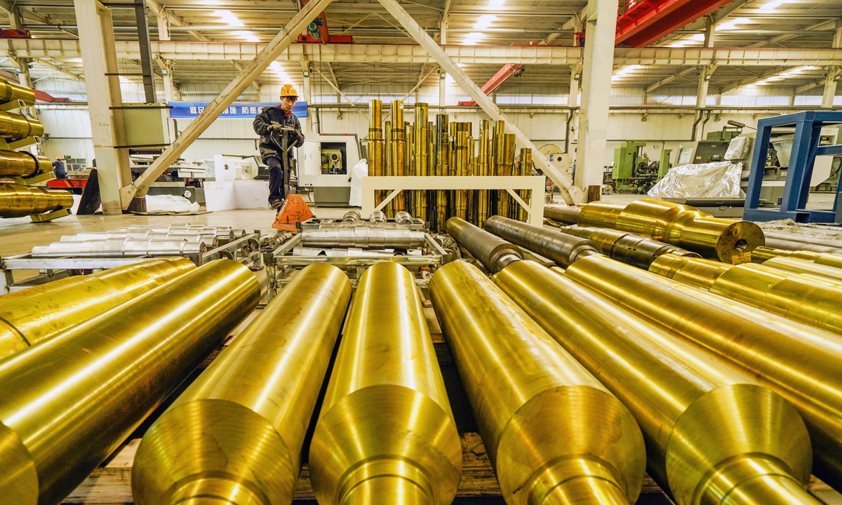 A worker transports components of mining equipment inside a manufacturing plant in Zunhua, North China's Hebei Province on March 17, 2024. Hebei's exports in the first two months grew by 20.7 percent year-on-year to 54.19 billion yuan ($7.63 billion), data from the local customs authority showed. Photo: cnsphoto