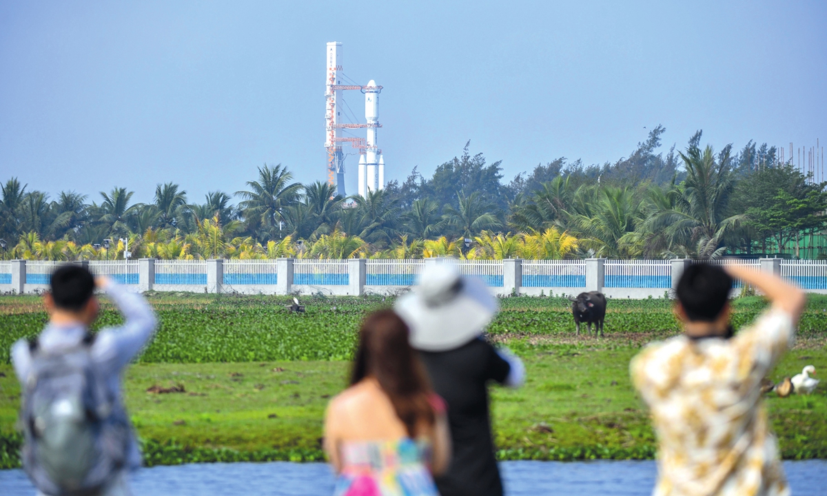 A combination of the relay satellite Queqiao-2 and a Long March-8 Y3 carrier rocket is vertically transferred to the launch area at the Wenchang Space Launch Center in South China's Hainan Province on March 17, 2024. The satellite is projected to be launched within the next few days. Photo: VCG