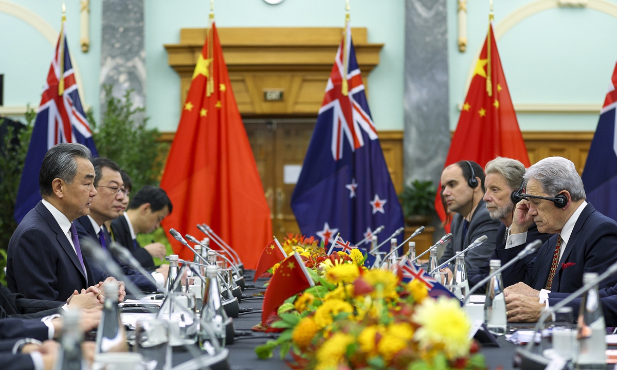 Chinese Foreign Minister Wang Yi (left), also a member of the Political Bureau of the Communist Party of China Central Committee, meets with New Zealand Deputy Prime Minister and Minister of Foreign Affairs Winston Peters (right) in Wellington on March 18, 2024. Photo: VCG 