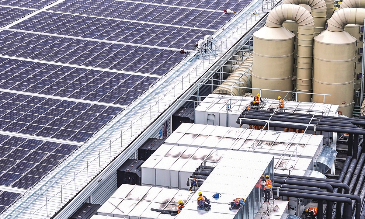 Workers are seen at a project with an annual output of 10 gigawatts of high-efficiency solar cells in Huai'an, East China's Jiangsu Province on March 18, 2024. China's installed solar power generation capacity rose by 55.2 percent in 2023, data released by the National Energy Agency showed. Photo: cnsphoto