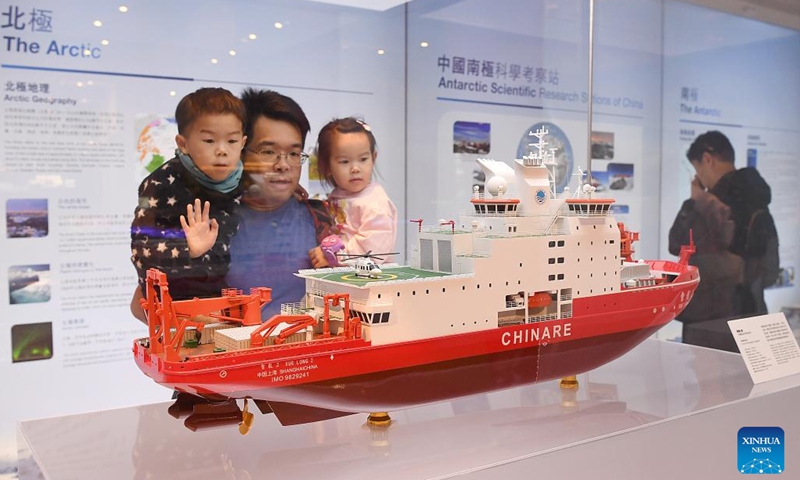 Visitors view a model of China's polar icebreaker Xuelong 2 at the Polar Research and Climate Change exhibition at Hong Kong Science Museum in Hong Kong, south China, March 19, 2024. Available to the public from March 18 till June 26, the exhibition will expose audiences to the scientific expeditions and research accomplishments of China's polar icebreaker Xuelong 2.(Photo: Xinhua)