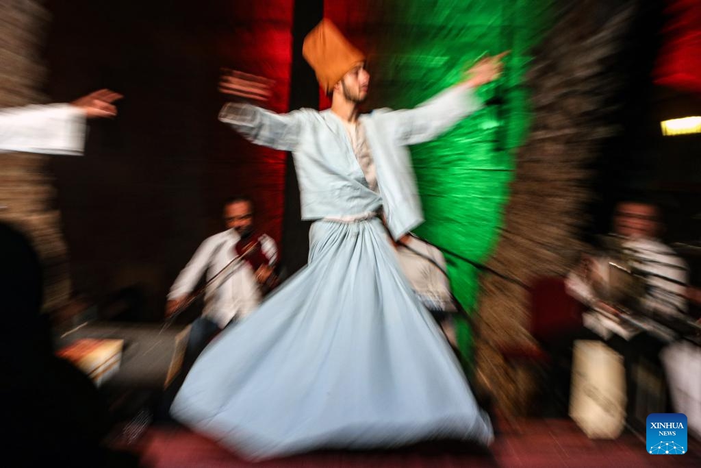 A dancer performs a Sufi dance at Prince Taz Palace during Ramadan in Cairo, Egypt, on March 19, 2024.(Photo: Xinhua)