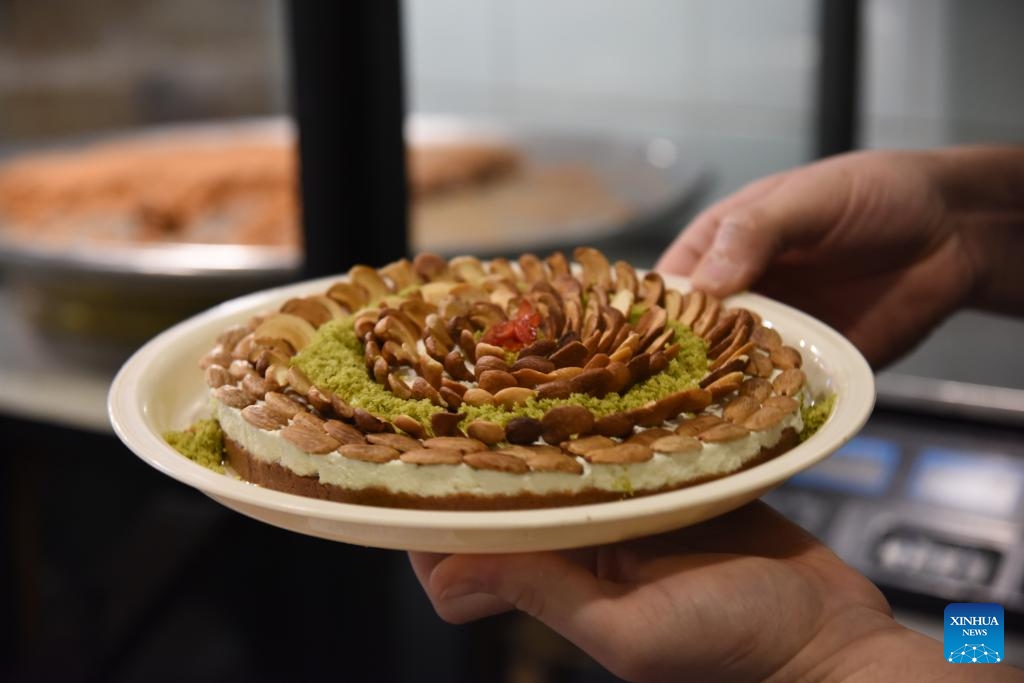 A vendor prepares sweets during the Ramadan in Tripoli, Lebanon, March 19, 2024.(Photo: Xinhua)
