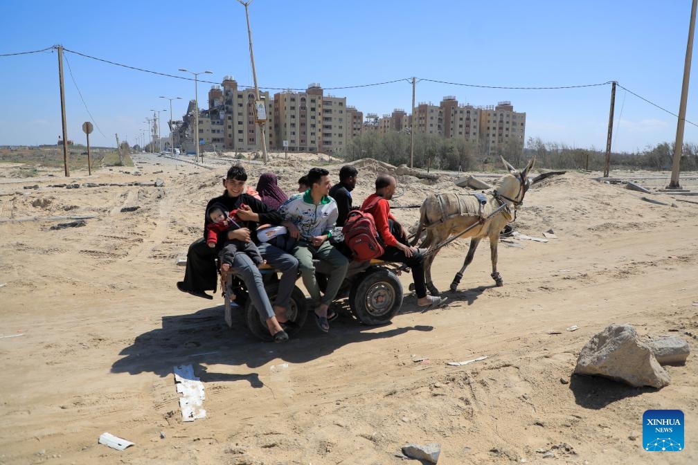 Palestinians fleeing from Gaza City arrive in the central Gaza Strip, on March 20, 2024. The Palestinian death toll from the ongoing Israeli attacks in the Gaza Strip has risen to 31,923, with 74,096 others wounded, the Hamas-run Health Ministry said Wednesday.(Photo: Xinhua)