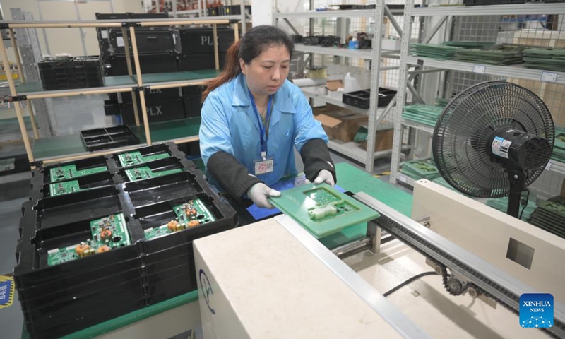 A worker works at Skytimes Green Energy Co., Ltd. in Fuzhou, southeast China's Fujian Province, March 20, 2024. In recent years, private enterprises in Fujian have been focusing on the new demands of the international market, continuously increasing technological innovation and expanding overseas markets and sales channels.(Photo: Xinhua)