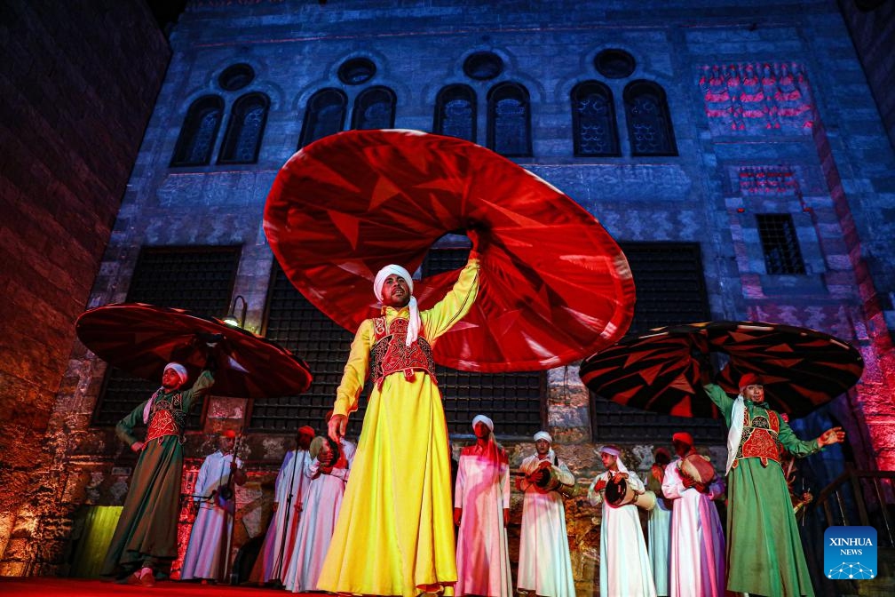 Dancers perform Tanoura, a traditional Egyptian folk dance, during the holy month of Ramadan at the Sultan Al-Ghuri complex in Cairo, Egypt, on March 20, 2024.(Photo: Xinhua)
