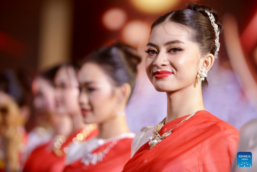 Models present gems and jewelry during the 15th edition of Cambodia International Gems and Jewelry Fair in Phnom Penh, Cambodia on March 21, 2024. The 15th edition of Cambodia International Gems and Jewelry Fair kicked off here on Thursday, aiming to boost trade of precious stones and jewelry, a commerce official said.(Photo: Xinhua)
