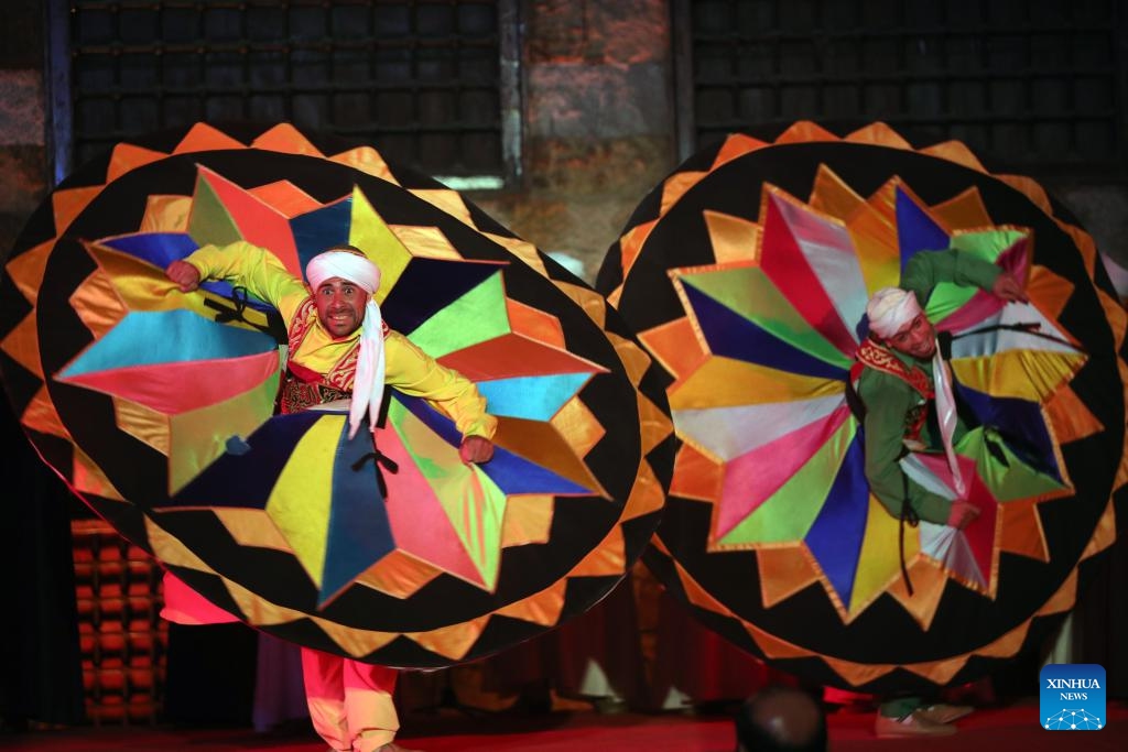 Dancers perform Tanoura, a traditional Egyptian folk dance, during the holy month of Ramadan at the Sultan Al-Ghuri complex in Cairo, Egypt, on March 20, 2024.(Photo: Xinhua)