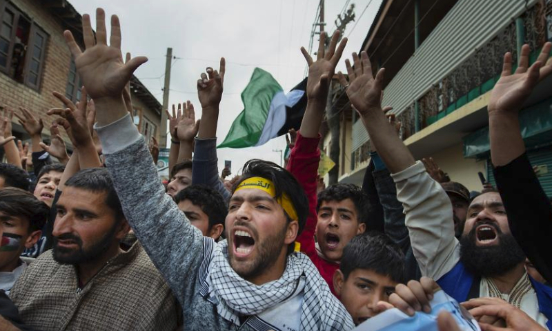 People attend a rally marking International Quds Day with protest against ongoing Israeli attacks on Gaza, in Srinagar city, the summer capital of Indian-controlled Kashmir, April 5, 2024. (Str/Xinhua)
