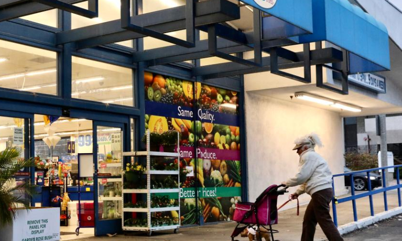 A shopper walks into a 99 Cents Only store in Arcadia, Los Angeles, the United States, on April 4, 2024. 99 Cents Only Stores, one of the leading extreme value retail chains in the United States, on Thursday announced plans to close all 371 of the company's stores and commence an orderly wind-down of its business operations after more than four decades.(Xinhua)