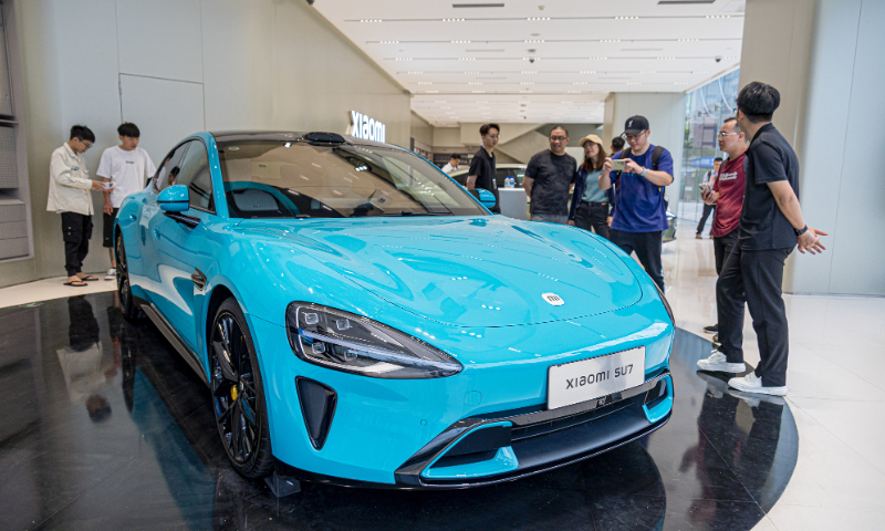 Xiaomi SU7 is seen at a Xiaomi store in Guangzhou, Guangdong Province on March 27, 2024. Photo: VCG