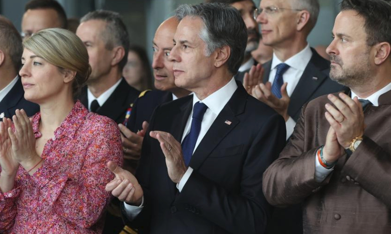 Canadian Foreign Minister Melanie Joly, U.S. Secretary of State Antony Blinken and Luxembourg Prime Minister Xavier Bettel (L-R, front) attend a ceremony to mark the 75th anniversary of NATO at the NATO headquarters in Brussels, Belgium, April 4, 2024. NATO marked the 75th anniversary since the signing of the North Atlantic Treaty on Thursday. (Xinhua/Zhao Dingzhe)