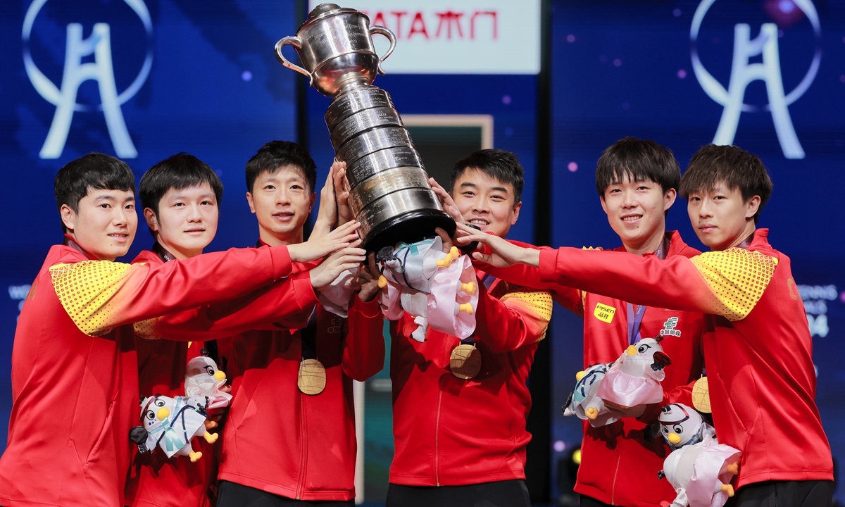 Chinese players pose for a photo after winning the men's title at the World Team Table Tennis Championships Finals in Busan, South Korea, on February 25, 2024. Photo: VCG